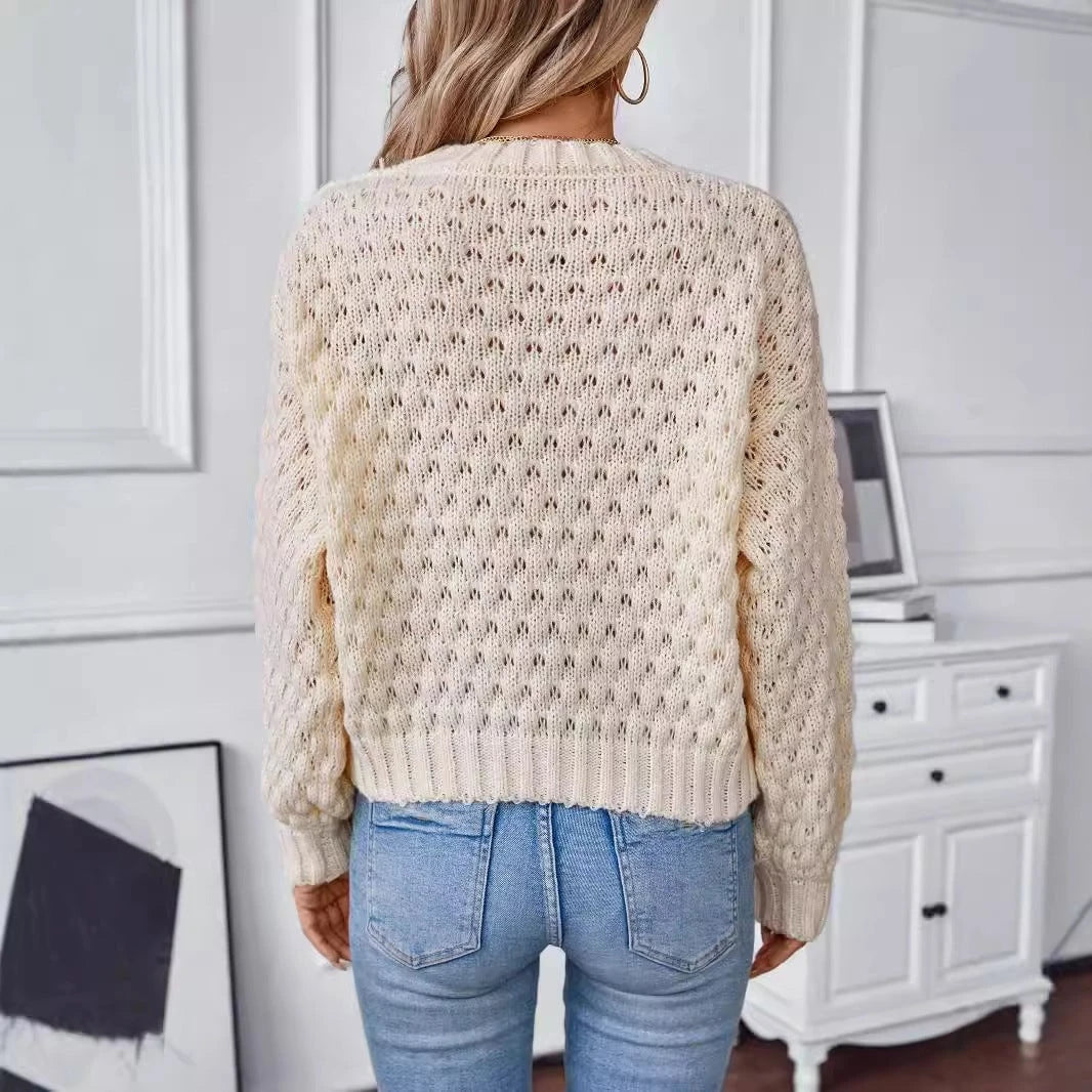 Women's cozy knit pullover with textured cable pattern and casual fit