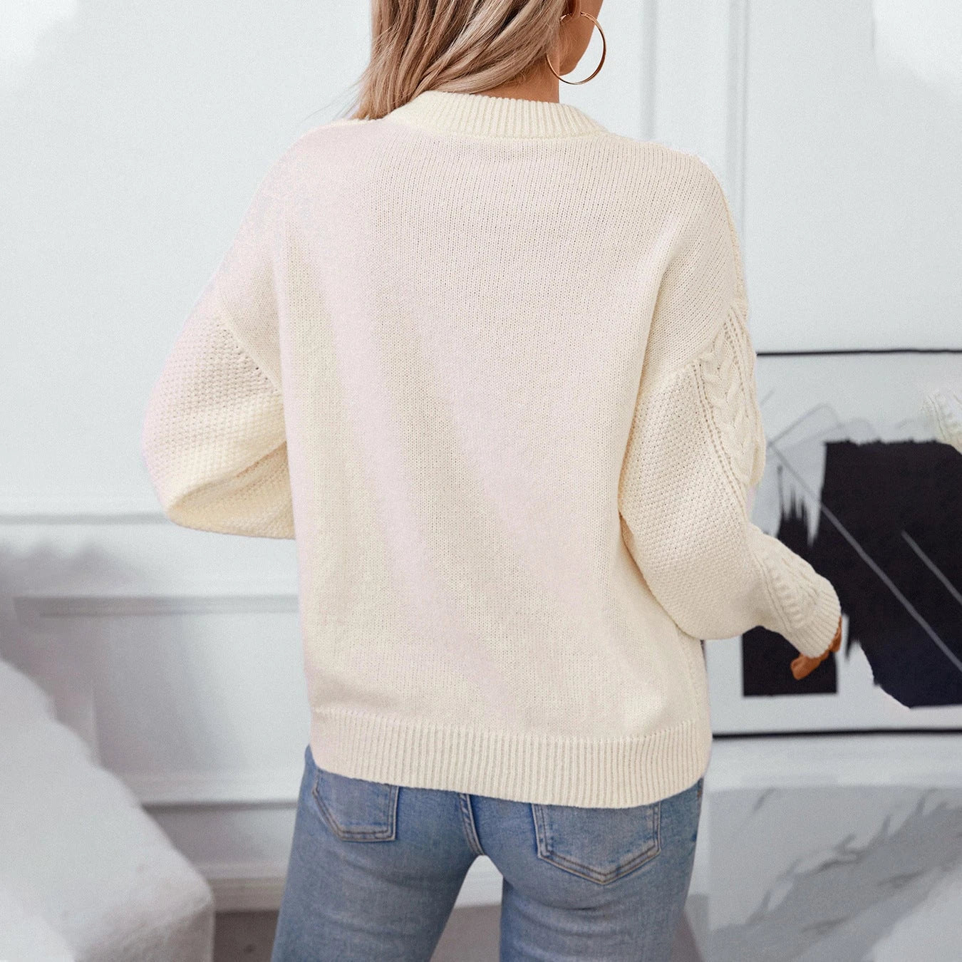 Ladies chunky knit pullover with sophisticated cable pattern and round neckline