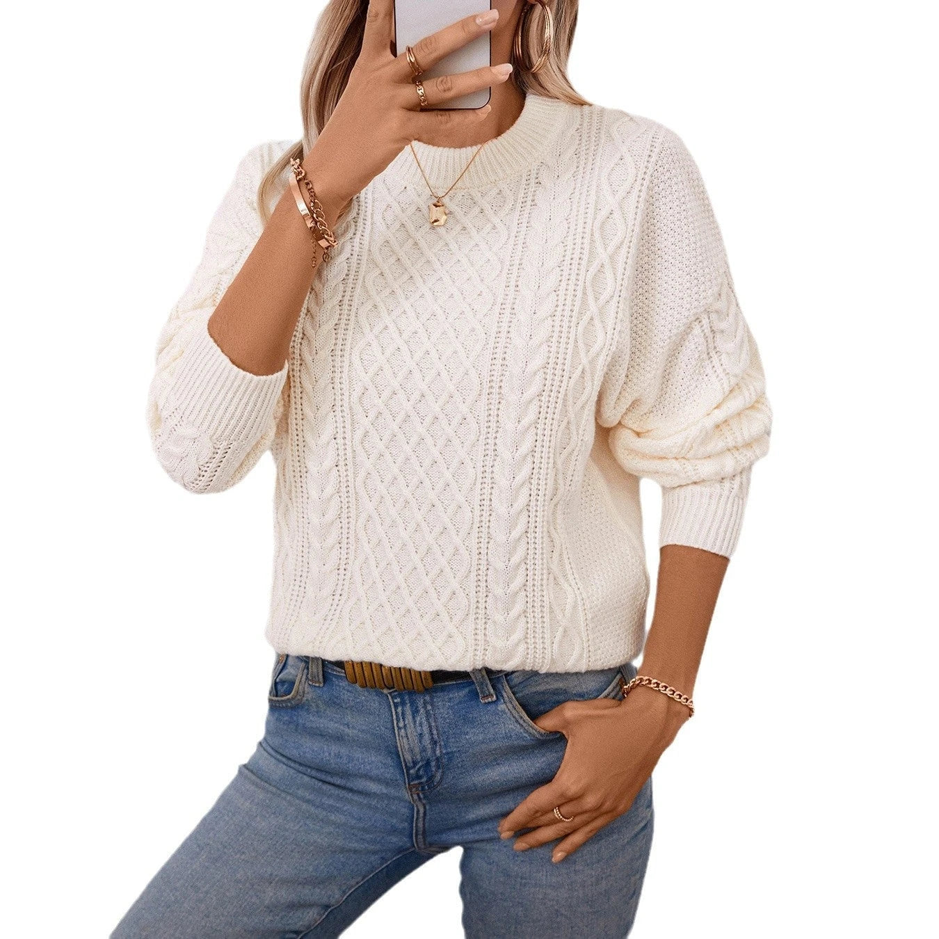 Ladies chunky knit pullover with sophisticated cable pattern and round neckline