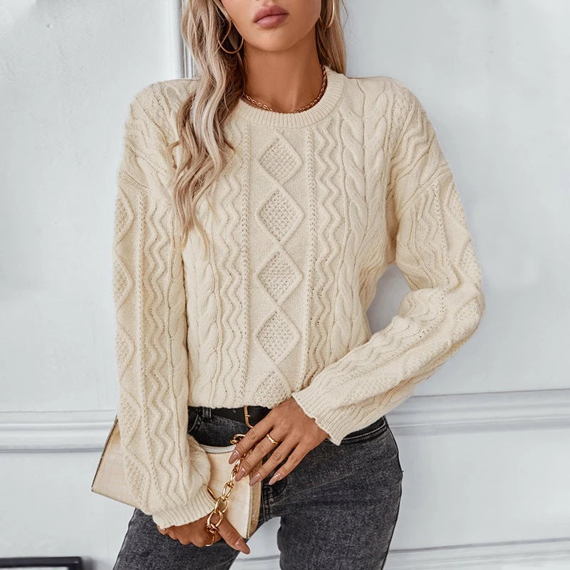 Women's chunky knit pullover with textured cable pattern