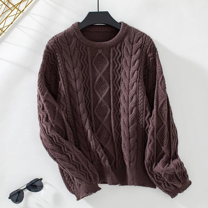 Women's chunky knit pullover with textured cable pattern