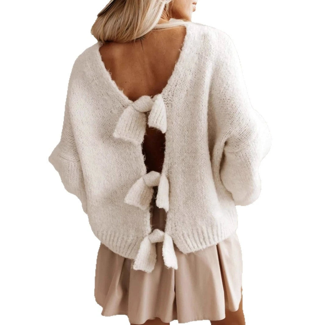 Women's casual knitted pullover with deep back cutout and bow details