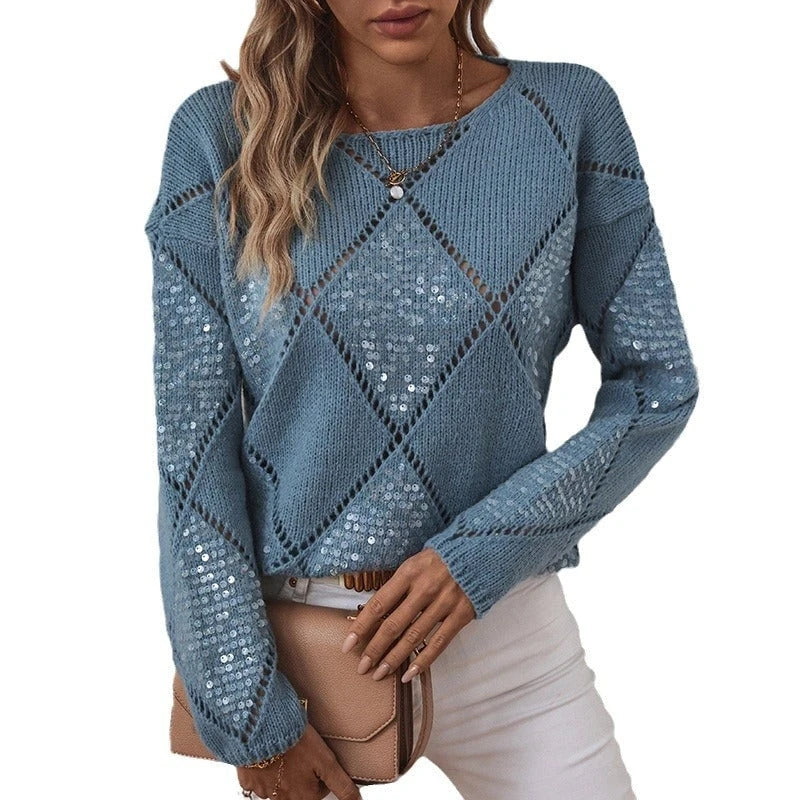 Ladies fashionable pullover with intricate knit design and glitter elements