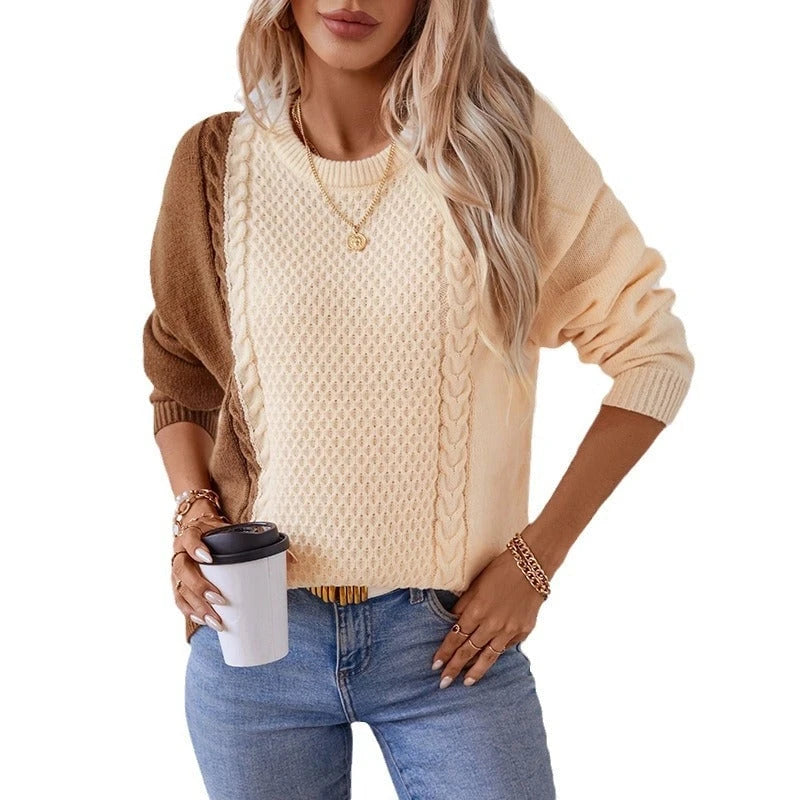 Ladies fashionable pullover with textured cable pattern and innovative color block design
