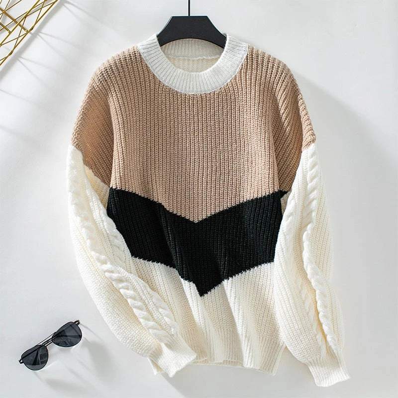 Ladies fashionable knit pullover with refined cable pattern sleeves and contrast colors