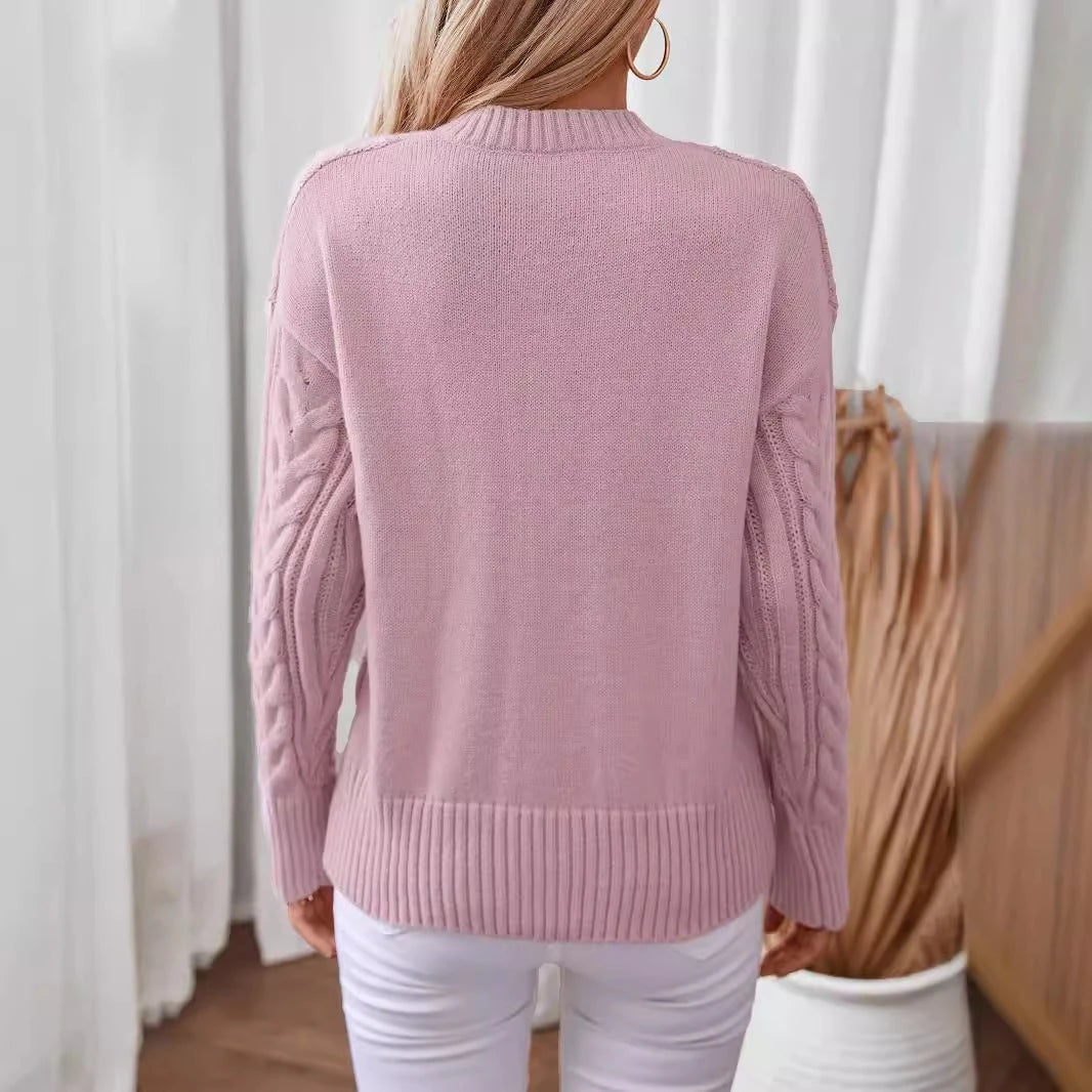 Women's fashionable knitted pullover with deep V-neck and cable pattern