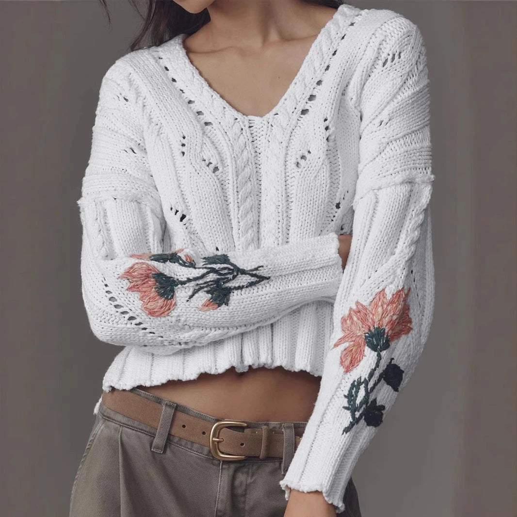 Women's knitted pullover with floral design and V-neck