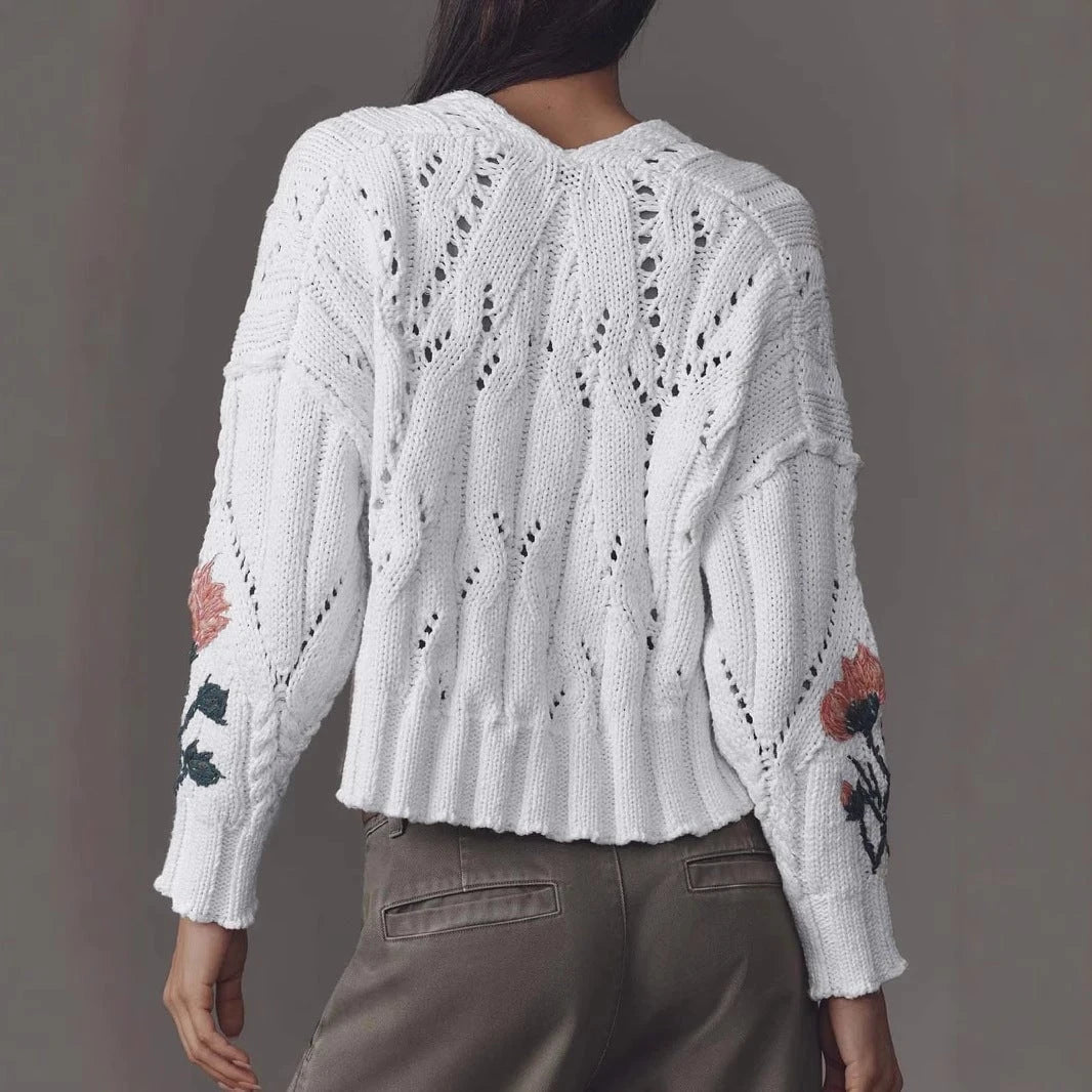 Women's knitted pullover with floral design and V-neck