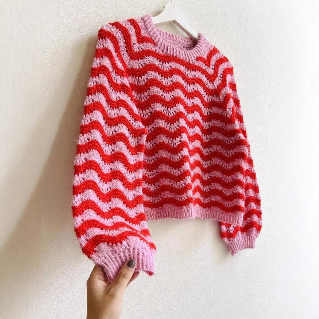 Women's knitted pullover with wave pattern and generous cut