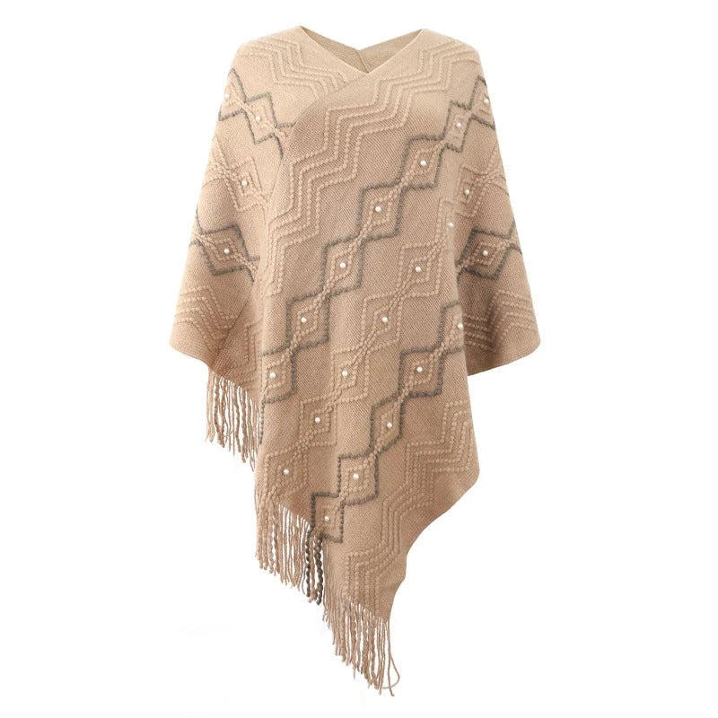 Ladies elegant poncho with eye-catching textured pattern and decorative fringes