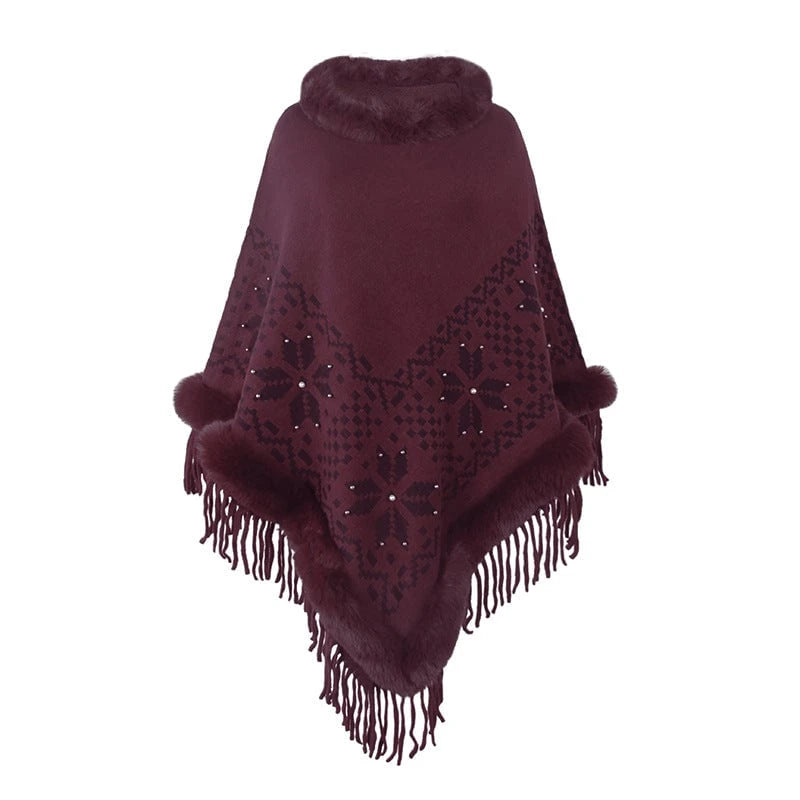 Ladies elegant poncho with decorative fringe design and faux fur trim