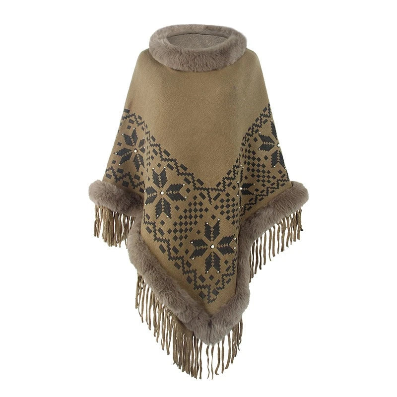 Ladies elegant poncho with decorative fringe design and faux fur trim