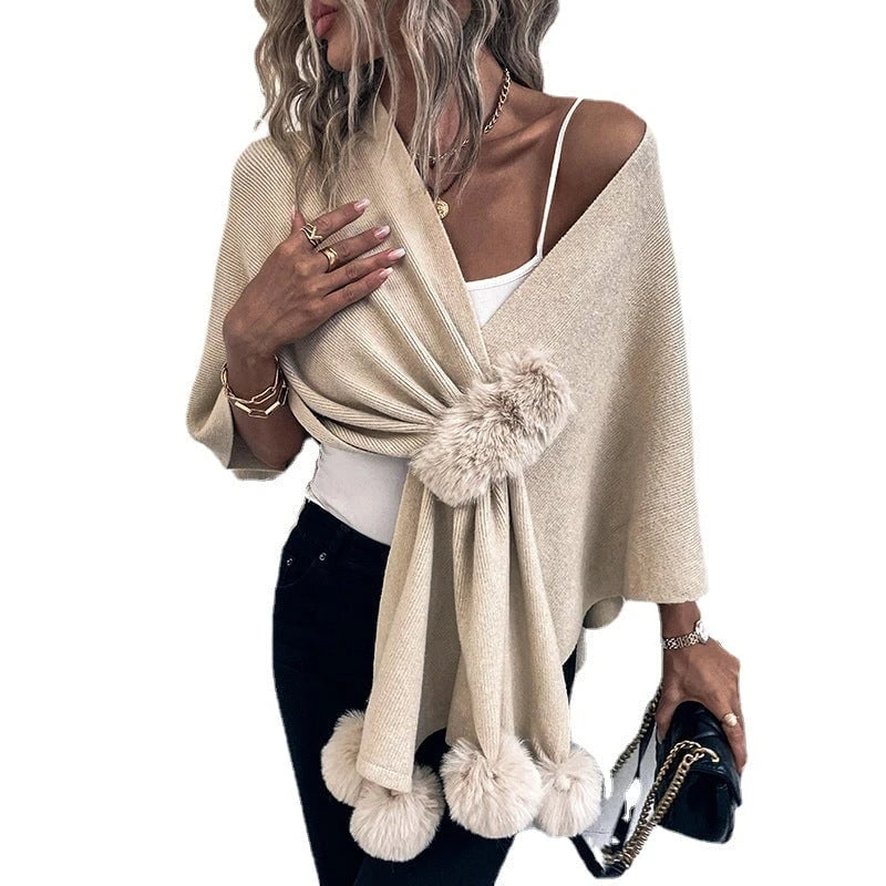 Ladies elegant poncho with luxurious faux fur trim