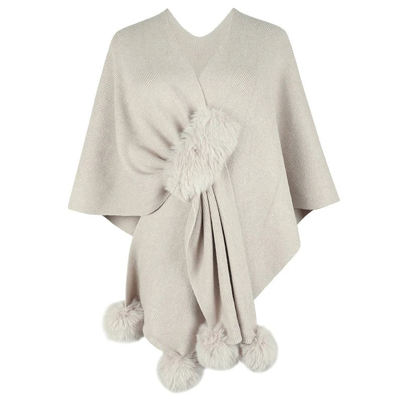 Ladies elegant poncho with luxurious faux fur trim