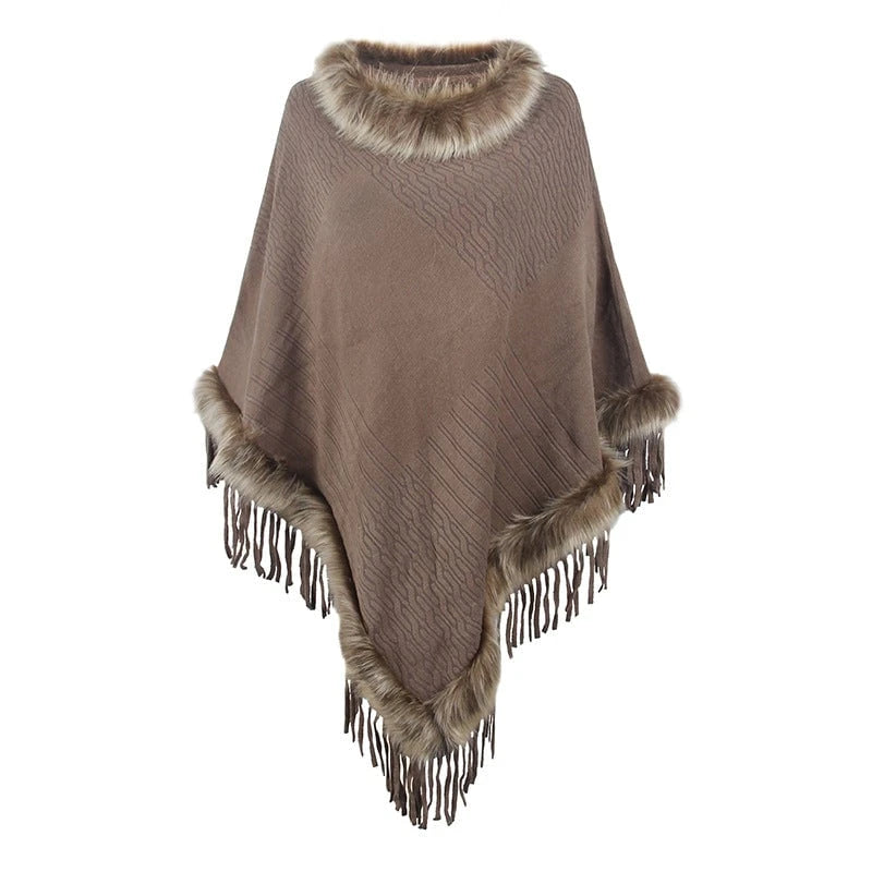 Women's elegant poncho with luxurious faux fur collar and decadent fringes