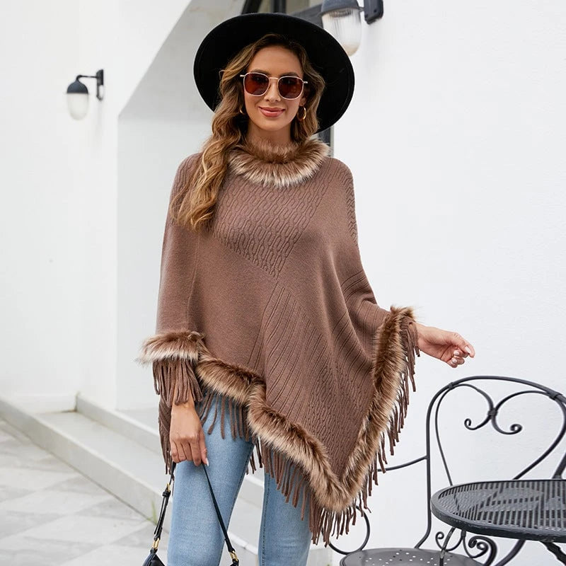 Women's elegant poncho with luxurious faux fur collar and decadent fringes