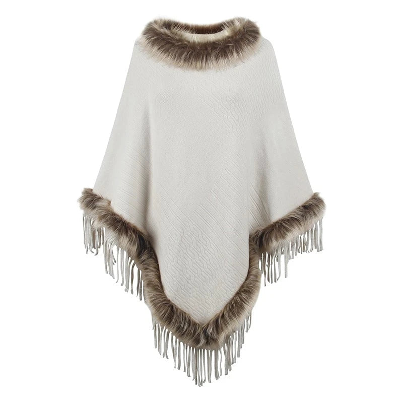 Women's elegant poncho with luxurious faux fur collar and decadent fringes