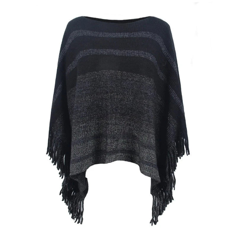 Ladies elegant poncho with textured design and fringed details