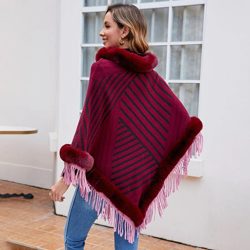 Ladies fashionable poncho with elegant fringe decoration