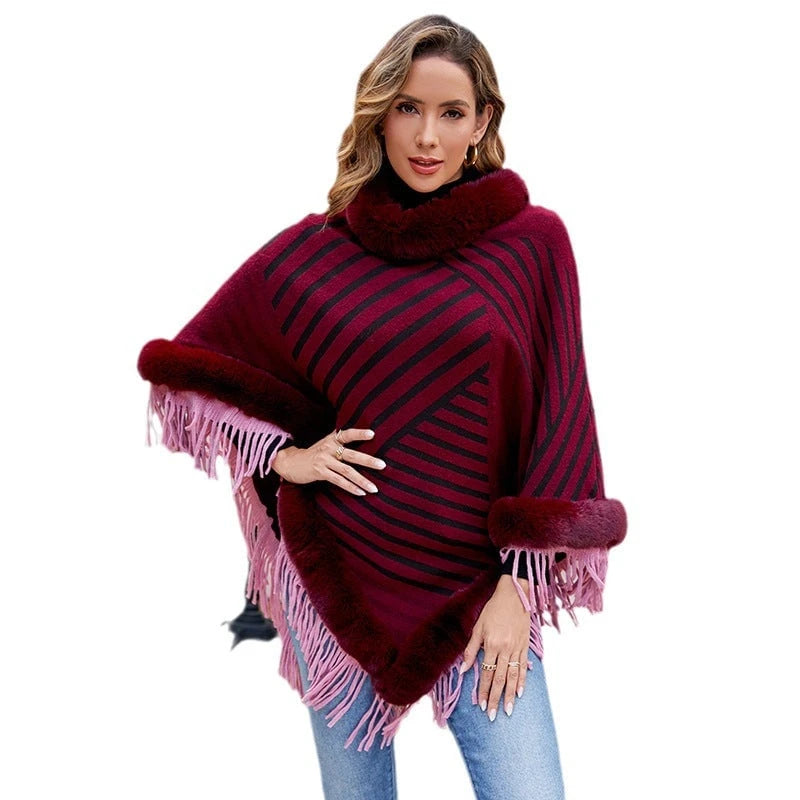 Ladies fashionable poncho with elegant fringe decoration