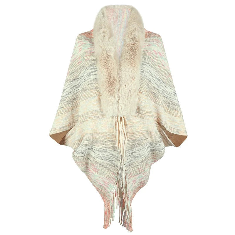 Women elegant poncho with luxurious faux fur collar and fringed hem