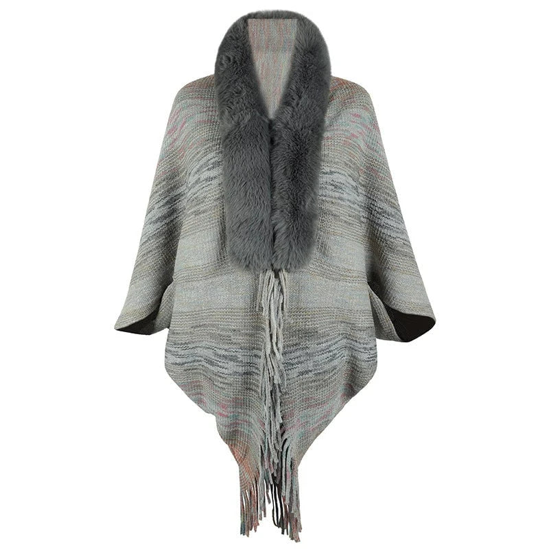 Women elegant poncho with luxurious faux fur collar and fringed hem