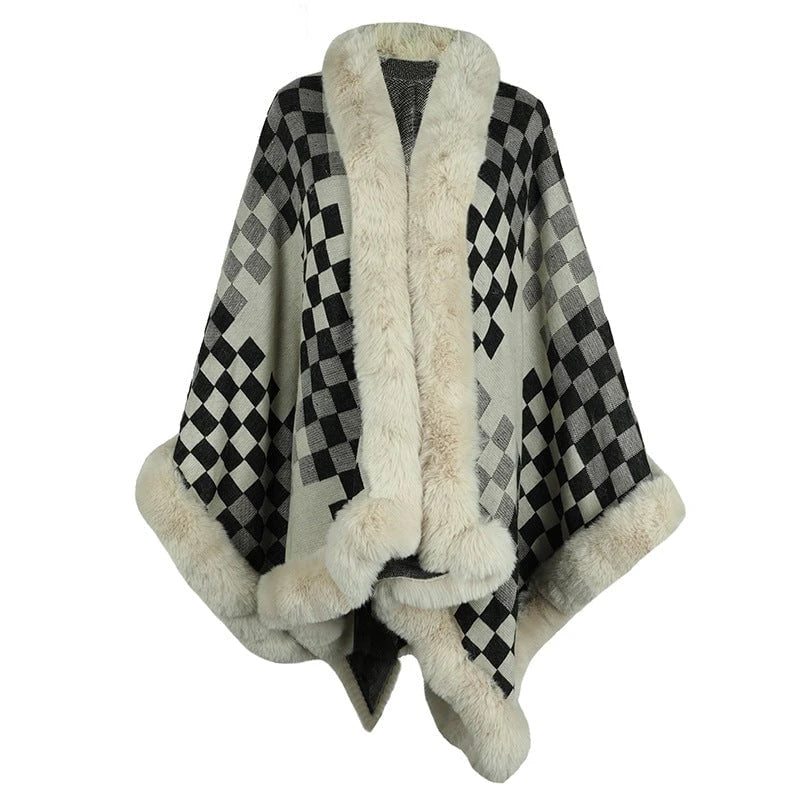 Ladies elegant knitted poncho with luxurious faux fur trim and geometric pattern