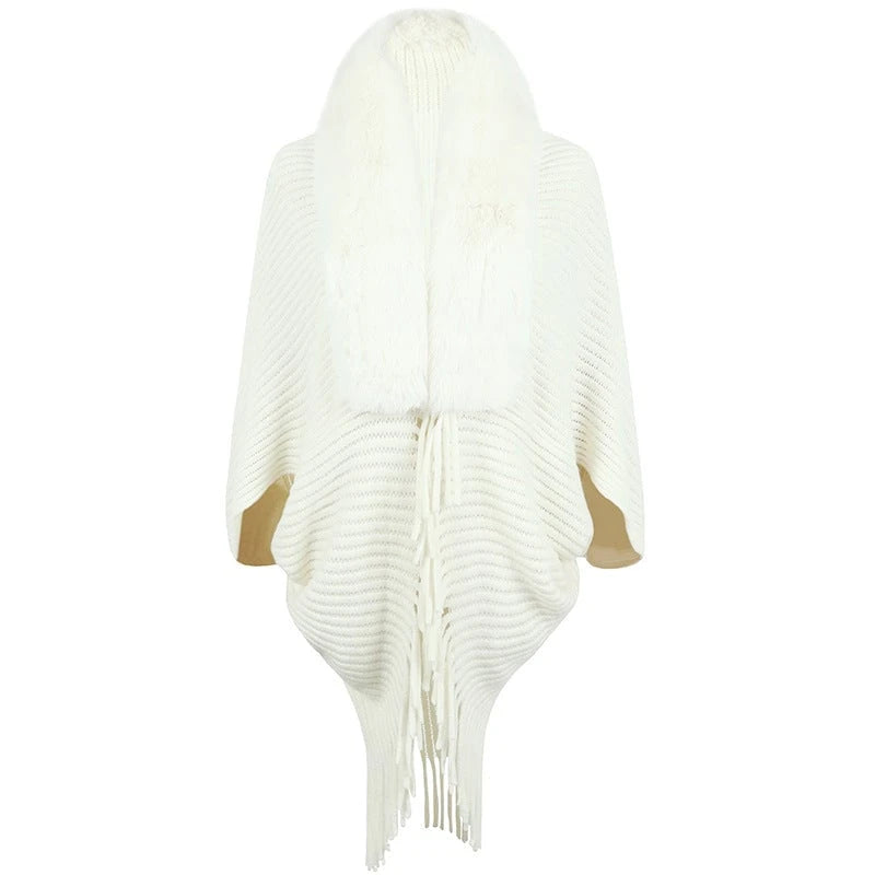 Women's luxurious knit poncho with elegant faux fur collar and fringes