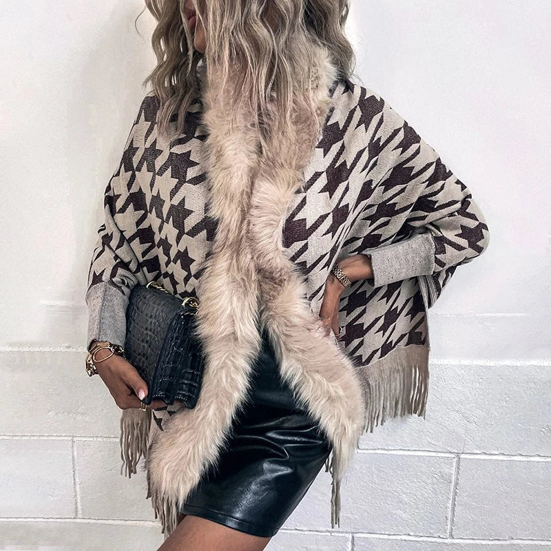 Ladies stylish poncho with exclusive fur trim and modern star pattern