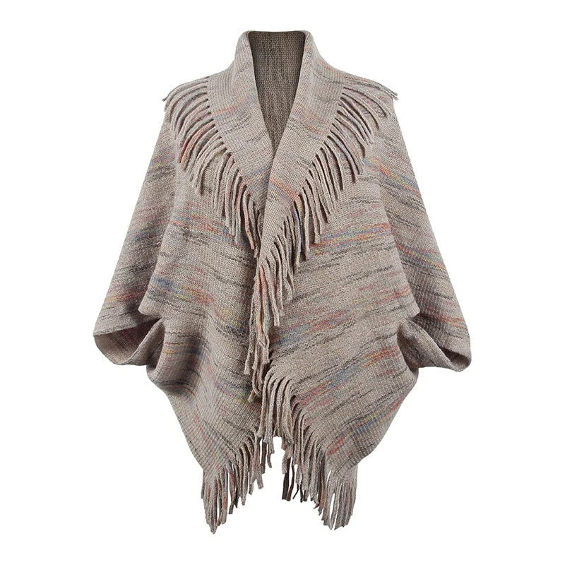 Women's knit poncho with luxurious fringes and modern design
