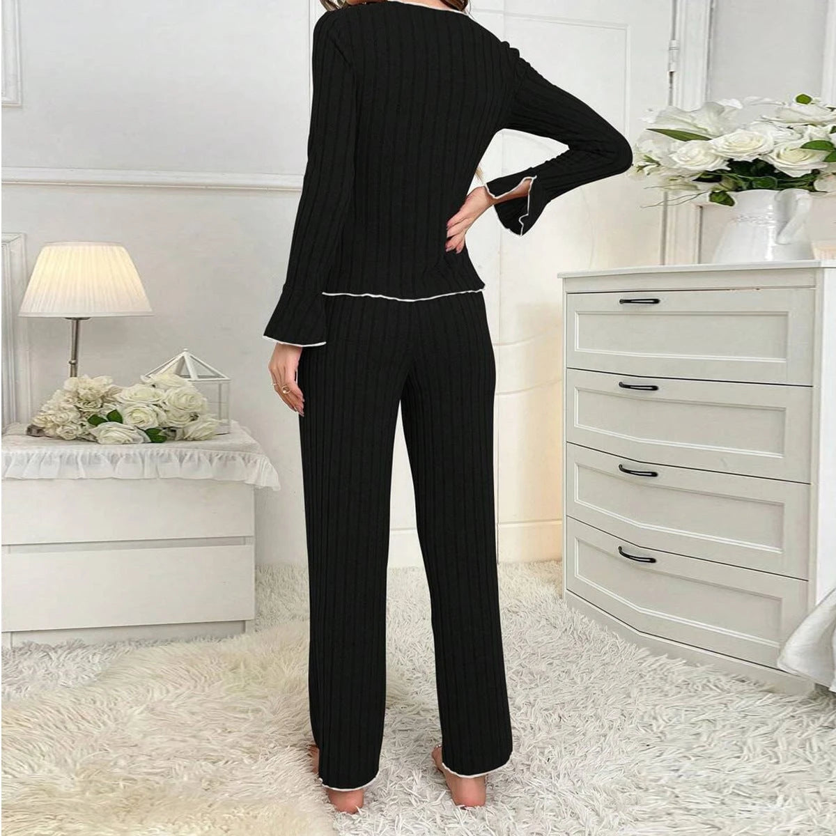 Women's pajama set with fine stripe texture and elegant details