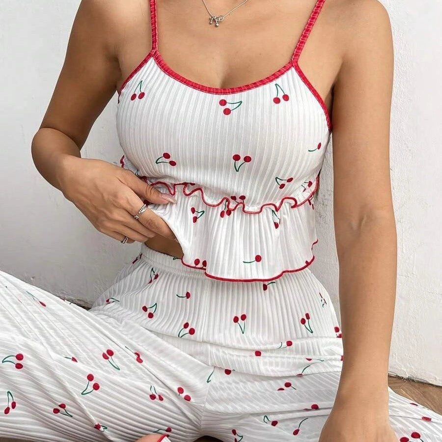 Ladies pajama set with fruity strawberry pattern and ruffle details