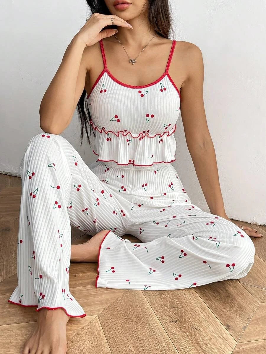 Ladies pajama set with fruity strawberry pattern and ruffle details