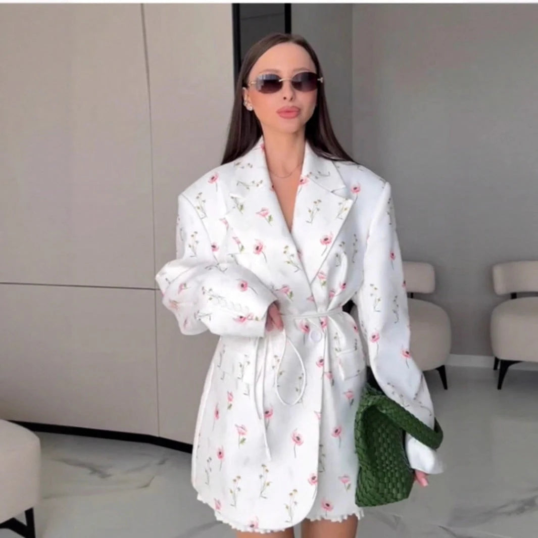 Ladies stylish blazer jacket with floral design and fitted belt