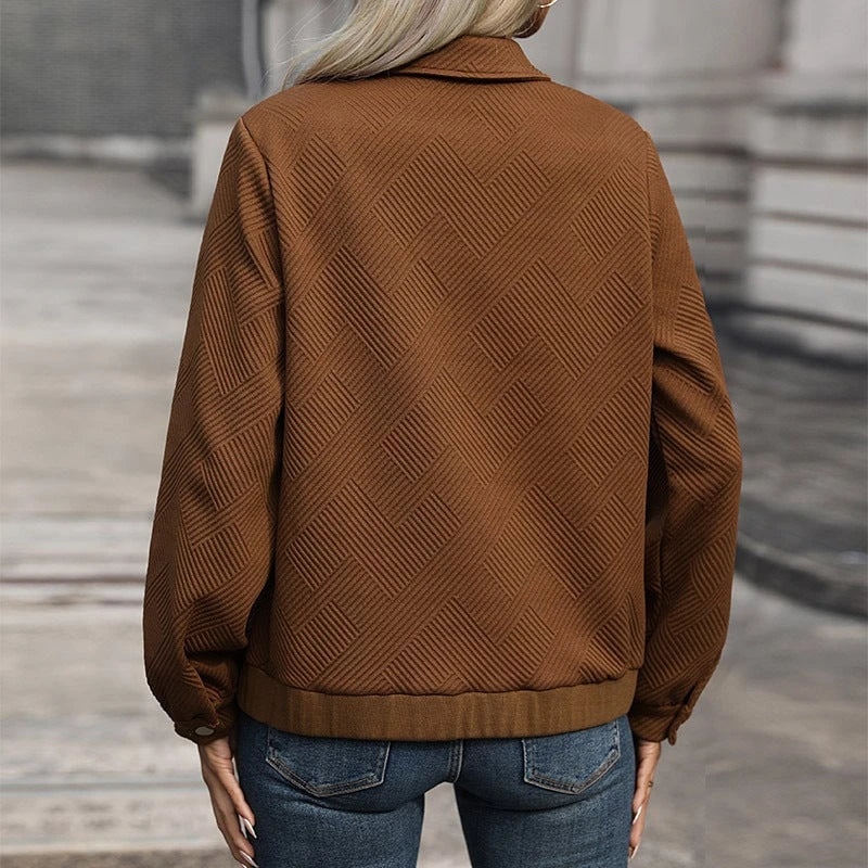 Women's modern utility jacket with structured outer material and practical pockets