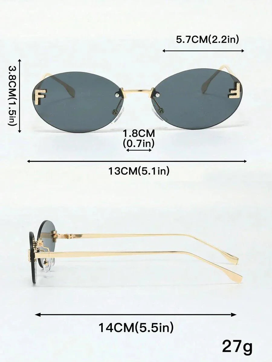 Oval Sunglasses With Golden Accents and Subtle Stones