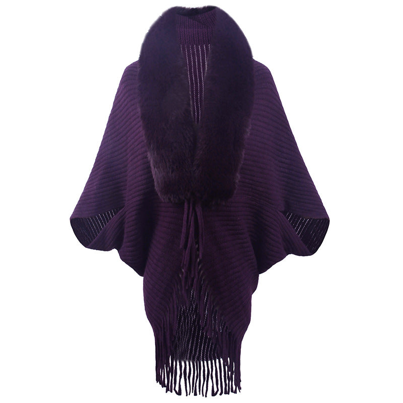 Women's luxurious knit poncho with elegant faux fur collar and fringes