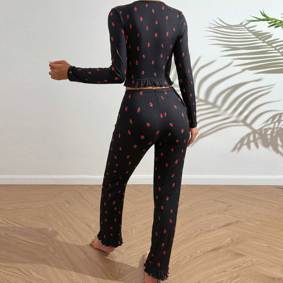 Women's casual pajama set with playful strawberry pattern