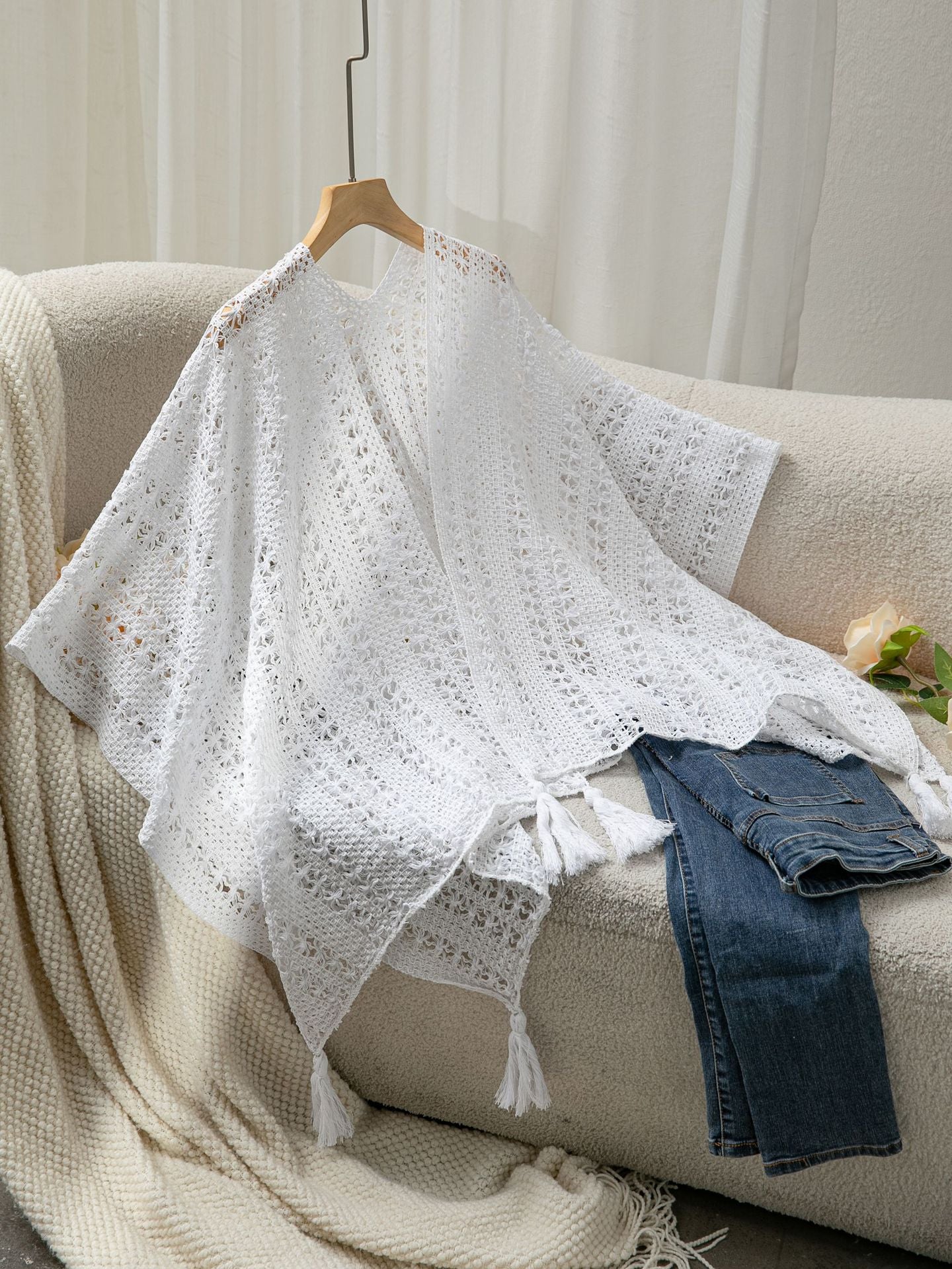 Ladies airy knit poncho with fringes