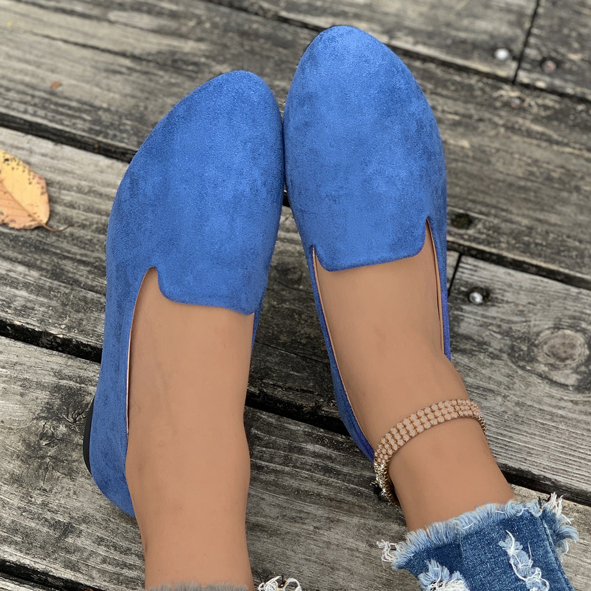 Ladies comfortable slippers in elegant design with soft surface texture