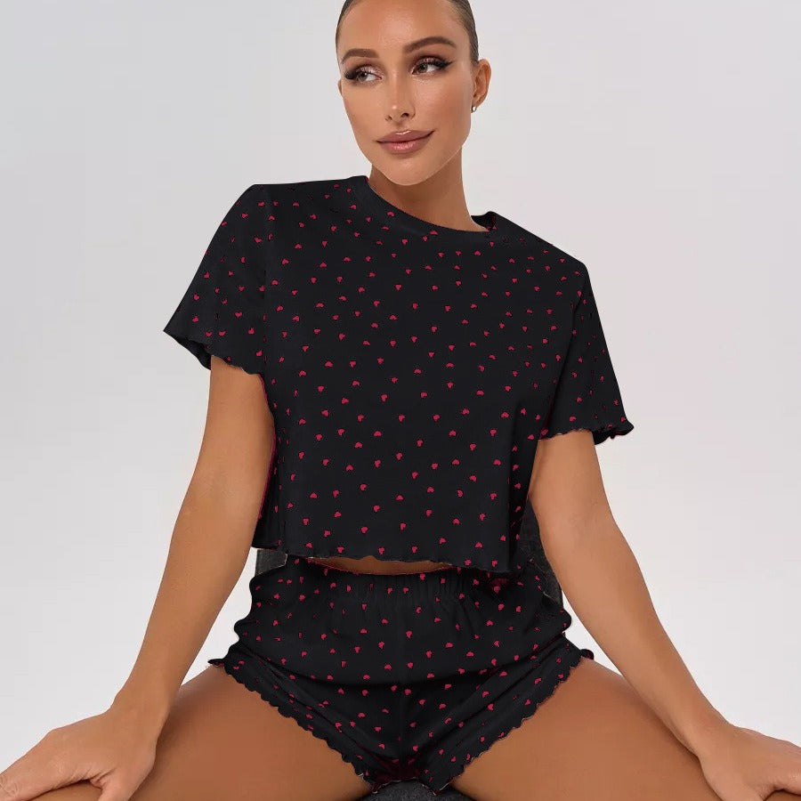 Women's pajama set with cheerful heart design and playful hem