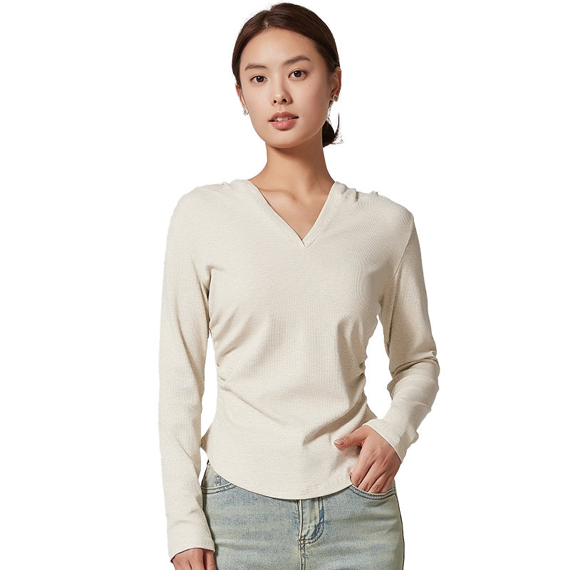 Ladies sporty top with hood and fitted cut