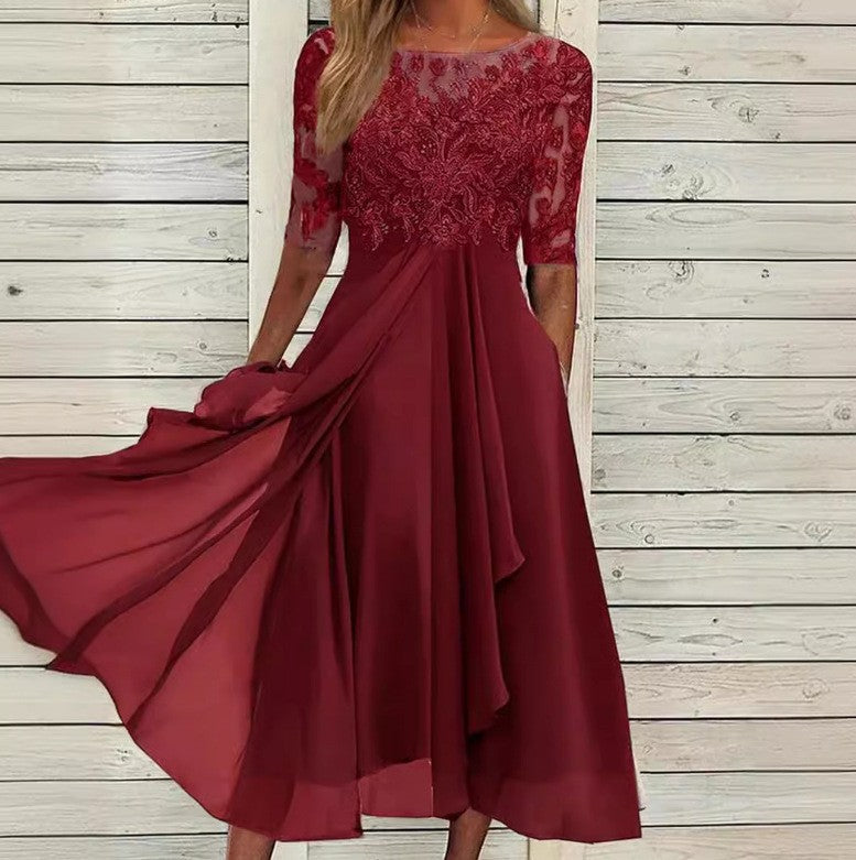 Women's elegant cocktail dress with floral lace top and flowing skirt
