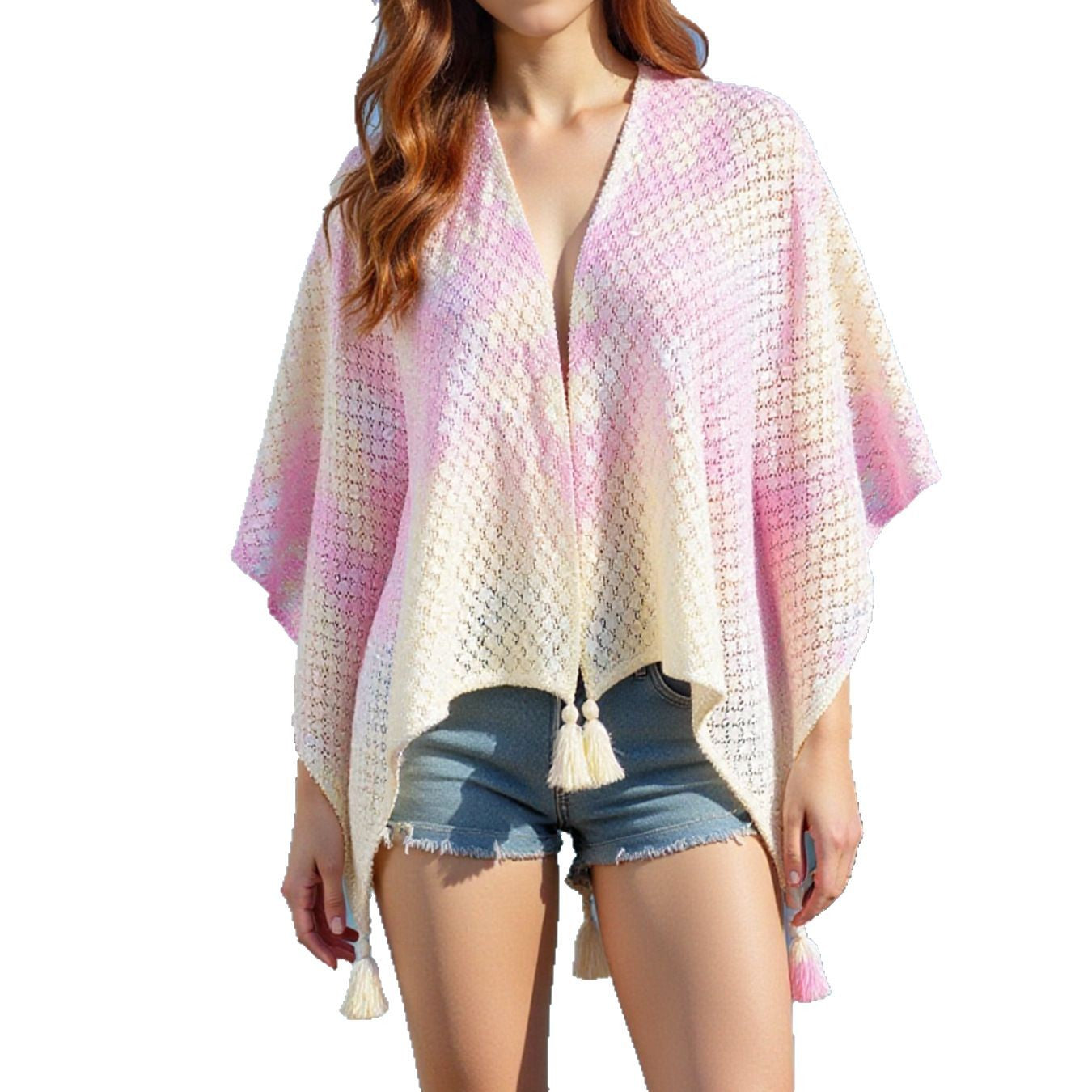 Ladies airy knitted poncho with decorative tassels