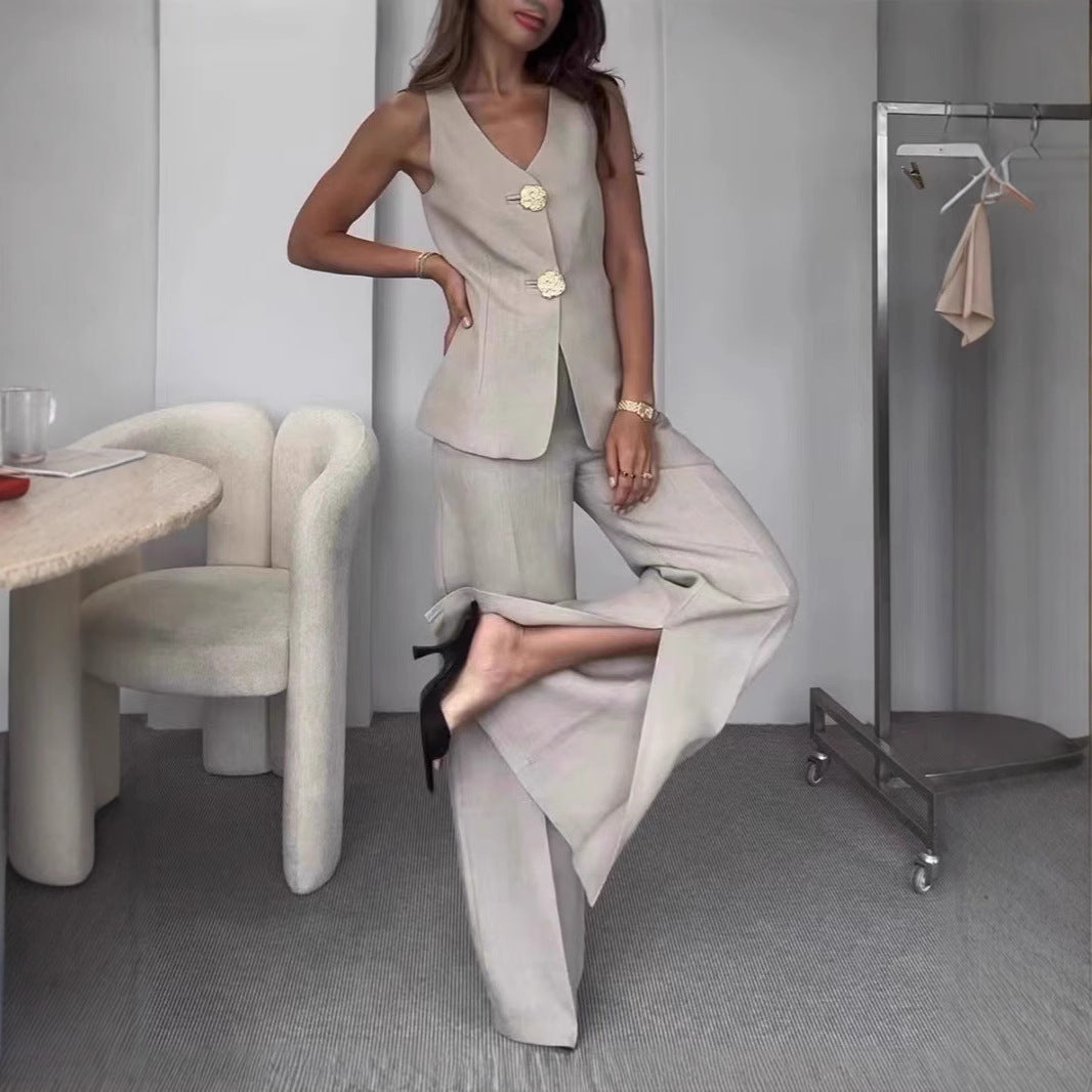 Ladies elegant pantsuit set with fitted blazer and wide-cut trousers