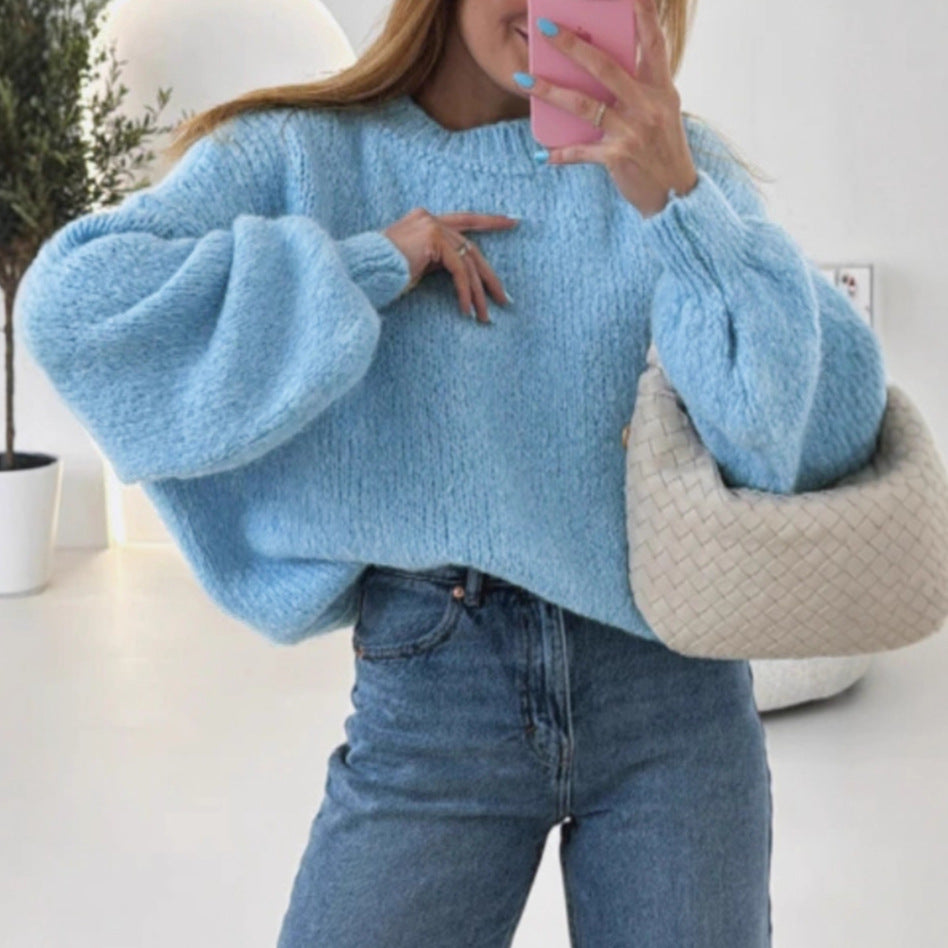 Women's cozy pullover with voluminous sleeves and textured design