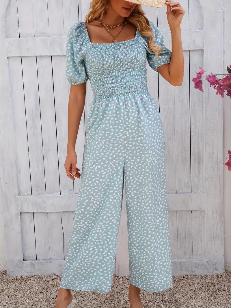 Women's floral patterned jumpsuit with puff sleeves and side pockets