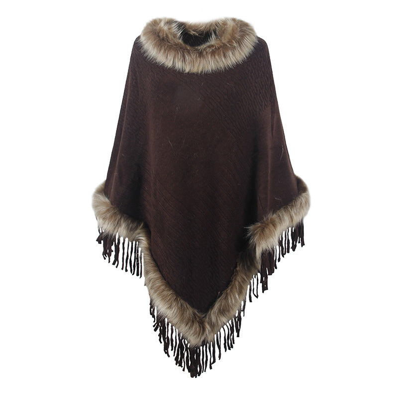 Women's elegant poncho with luxurious faux fur collar and decadent fringes