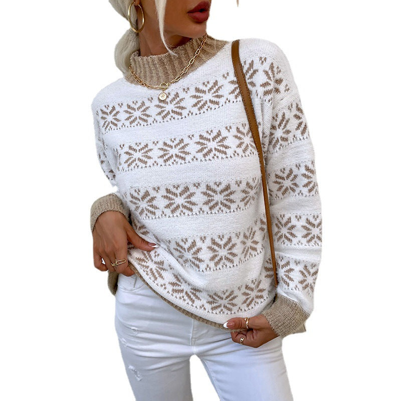 Women's knit pullover with winter motif and high neck collar
