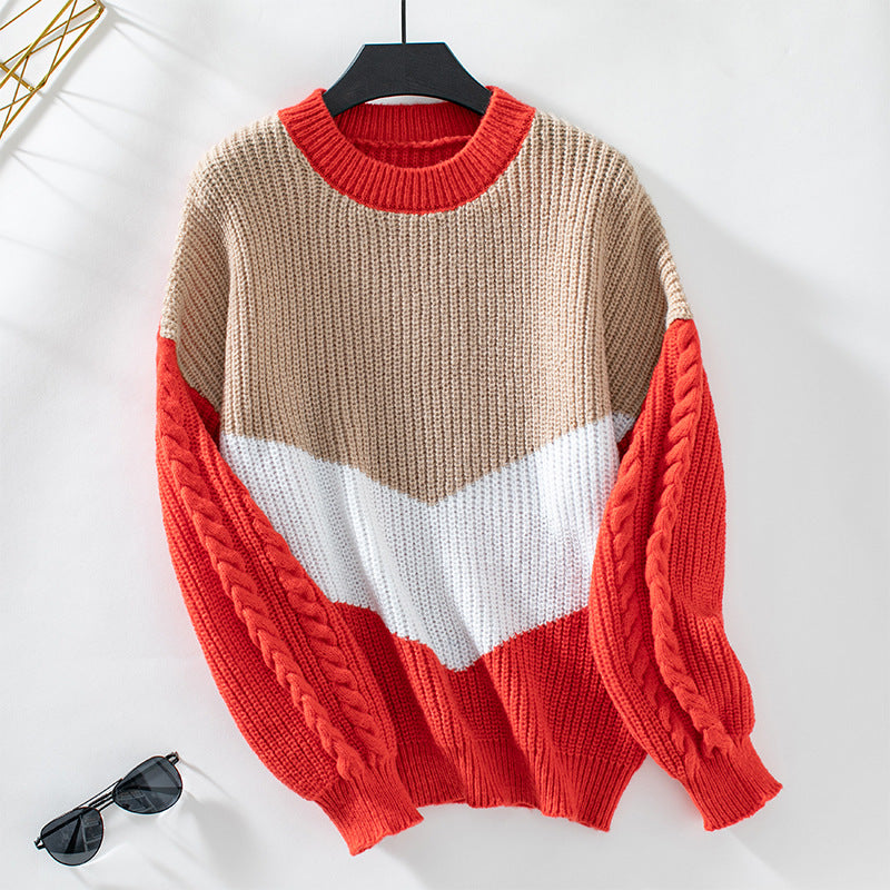 Ladies fashionable knit pullover with refined cable pattern sleeves and contrast colors